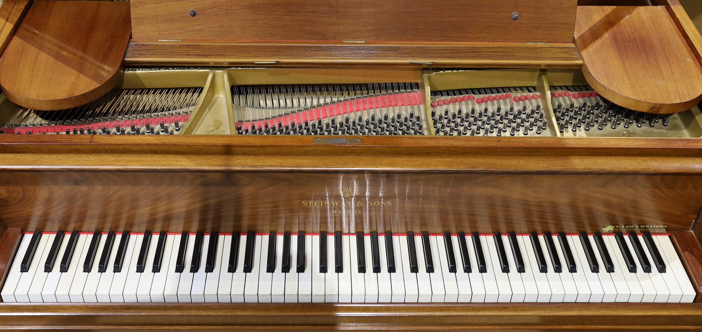 A Steinway & Sons of New York Patent Grand Construction mahogany cased piano, no.157302, width 148cm depth 180cm height 97cm